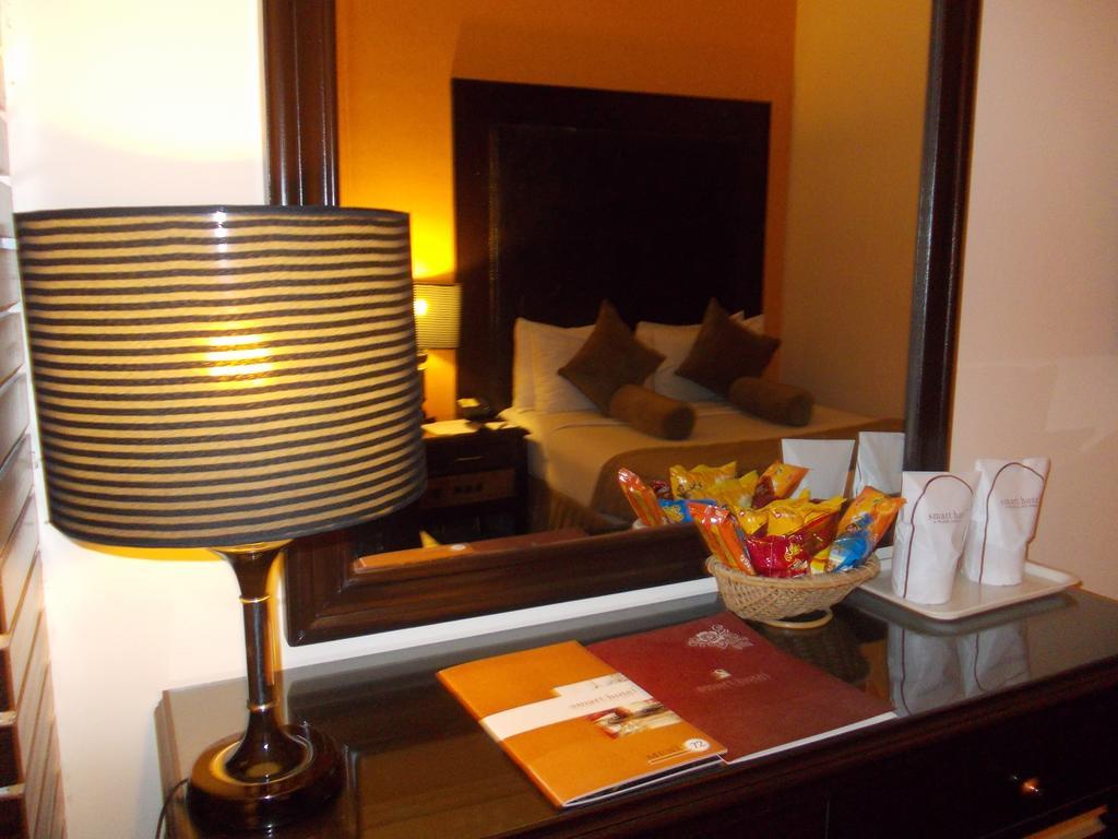 Smart Hotel Лахор Номер фото