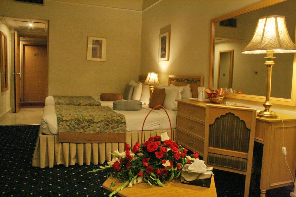 Smart Hotel Лахор Номер фото