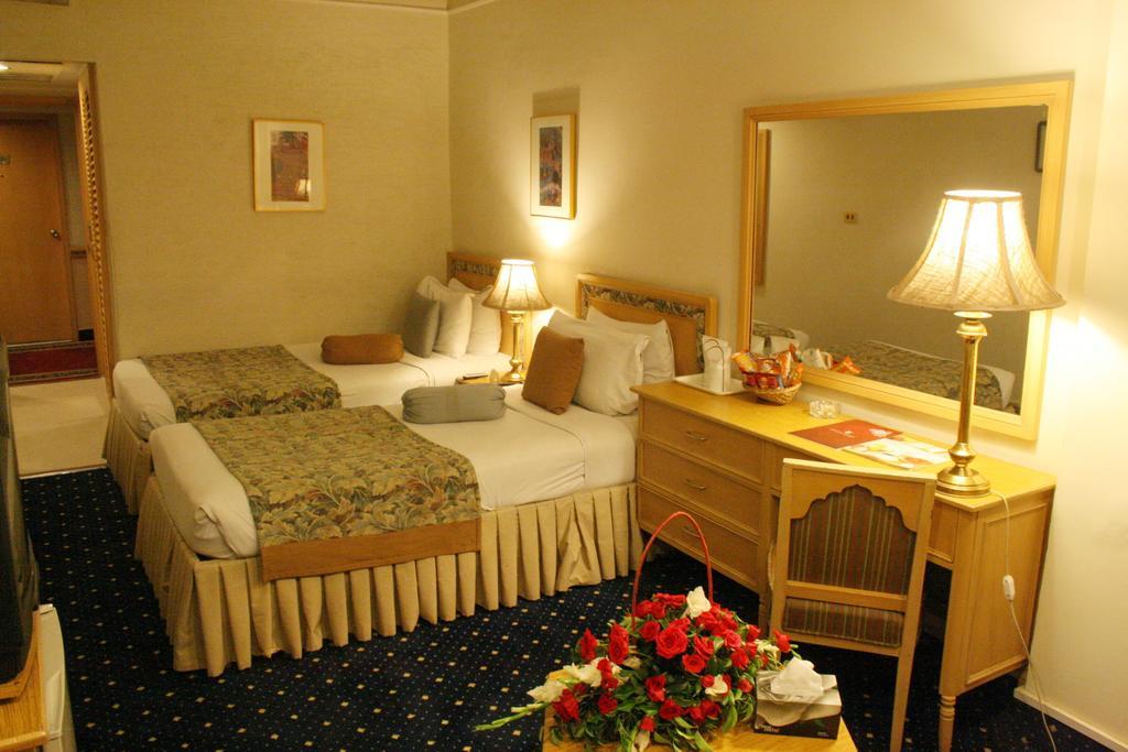 Smart Hotel Лахор Номер фото